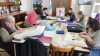 A palilleira amesá Ana Rosa Lista impartiu un obradoiro de encaixe con palillos no centro galego de Río Gallegos, na Arxentina